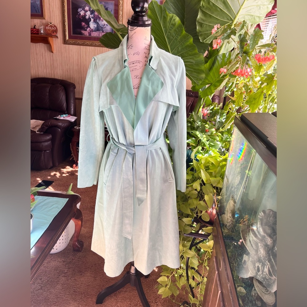 Woman’s LA Coalition sea foam green color long suede material trench coat.